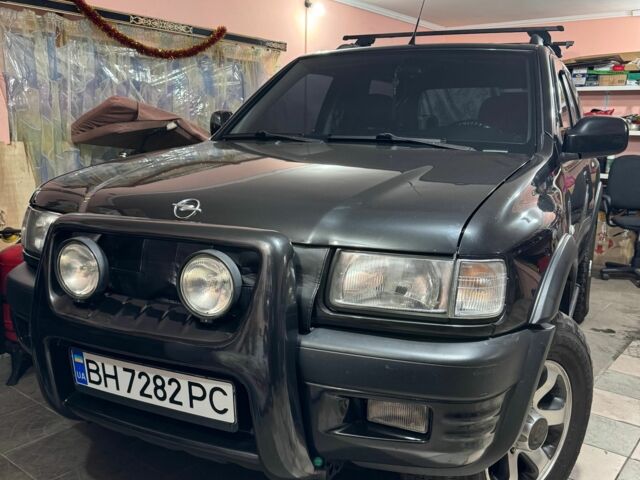 Чорний Опель Фронтера, об'ємом двигуна 2.2 л та пробігом 320 тис. км за 8000 $, фото 1 на Automoto.ua