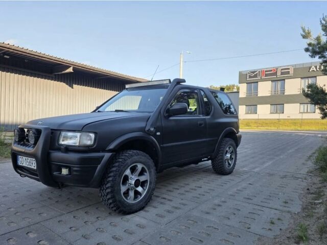 Чорний Опель Фронтера, об'ємом двигуна 2.2 л та пробігом 205 тис. км за 2500 $, фото 1 на Automoto.ua