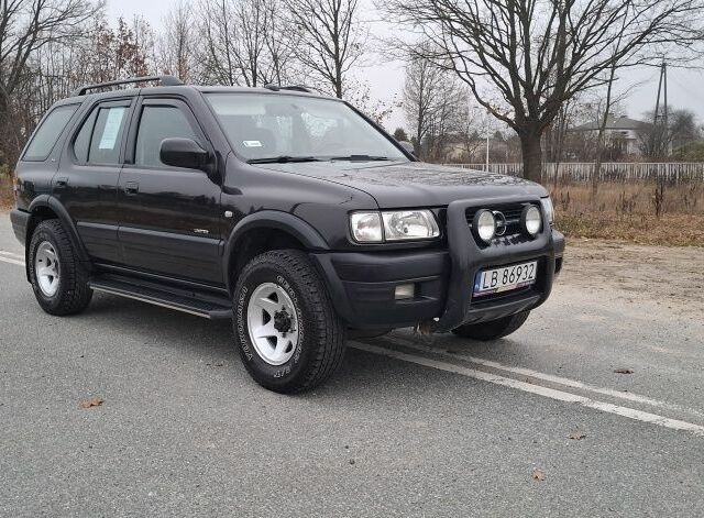 Чорний Опель Фронтера, об'ємом двигуна 2.2 л та пробігом 290 тис. км за 2100 $, фото 1 на Automoto.ua