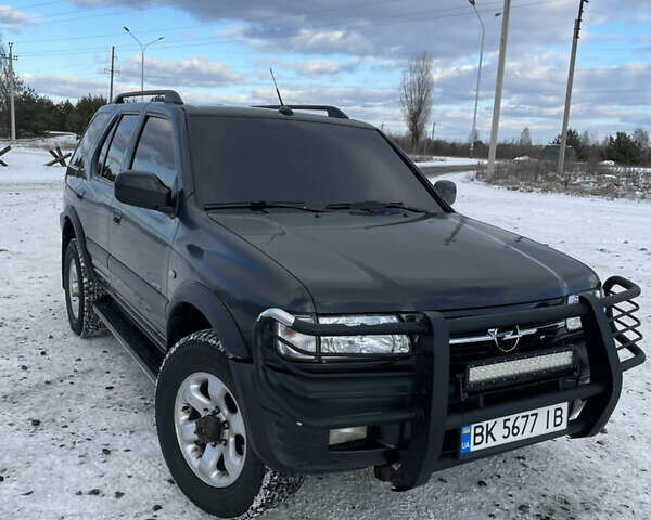 Чорний Опель Фронтера, об'ємом двигуна 2.2 л та пробігом 300 тис. км за 7300 $, фото 1 на Automoto.ua