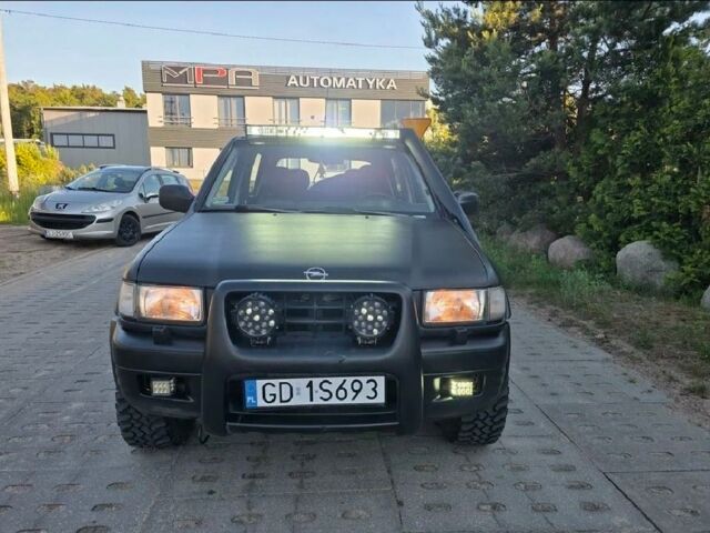 Чорний Опель Фронтера, об'ємом двигуна 2.2 л та пробігом 255 тис. км за 2000 $, фото 1 на Automoto.ua