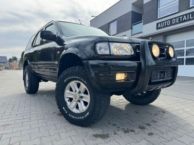 Черный Опель Фронтера, объемом двигателя 3 л и пробегом 161 тыс. км за 2767 $, фото 1 на Automoto.ua