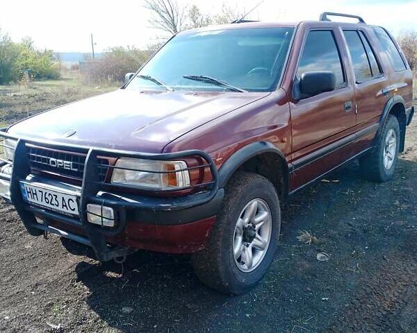 Красный Опель Фронтера, объемом двигателя 2.2 л и пробегом 280 тыс. км за 3370 $, фото 1 на Automoto.ua