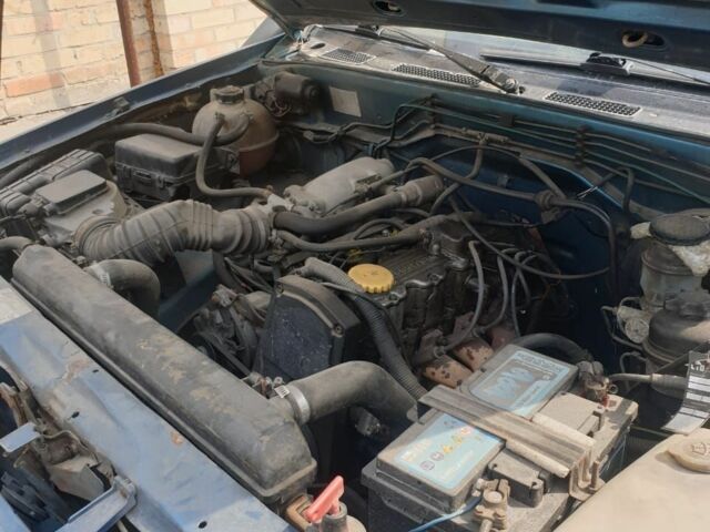 Синий Опель Фронтера, объемом двигателя 2.2 л и пробегом 336 тыс. км за 3000 $, фото 1 на Automoto.ua