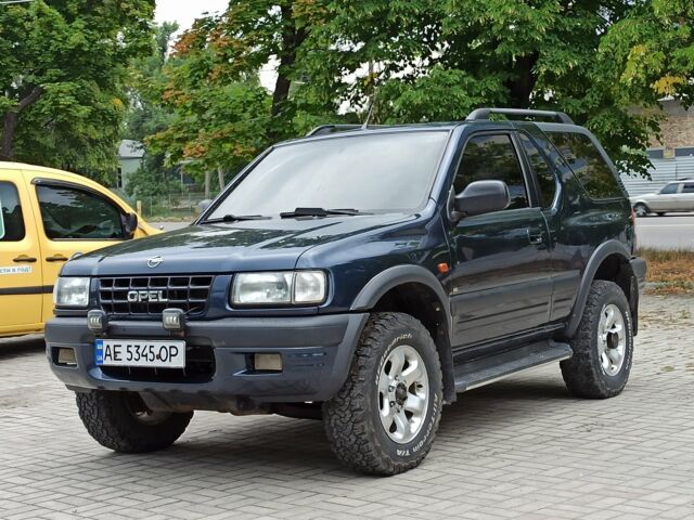Синий Опель Фронтера, объемом двигателя 2.2 л и пробегом 170 тыс. км за 6790 $, фото 1 на Automoto.ua