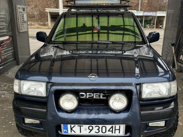 Синий Опель Фронтера, объемом двигателя 2.2 л и пробегом 300 тыс. км за 3300 $, фото 1 на Automoto.ua