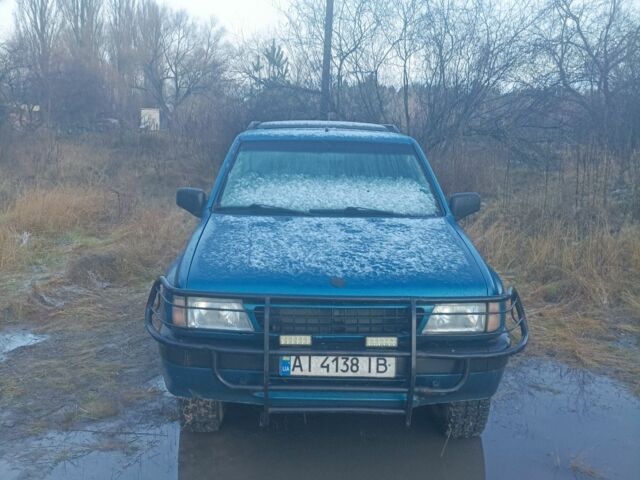 Зеленый Опель Фронтера, объемом двигателя 2 л и пробегом 280 тыс. км за 4100 $, фото 1 на Automoto.ua