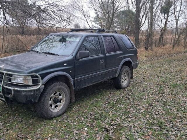 Зелений Опель Фронтера, об'ємом двигуна 2.3 л та пробігом 315 тис. км за 1899 $, фото 1 на Automoto.ua