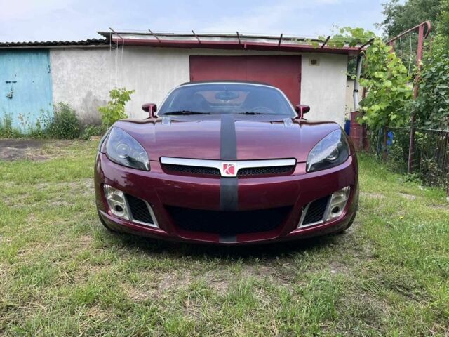 Красный Опель ГТ, объемом двигателя 2 л и пробегом 225 тыс. км за 12500 $, фото 1 на Automoto.ua