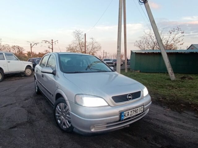 Серый Опель ГТ, объемом двигателя 1.6 л и пробегом 145 тыс. км за 2600 $, фото 1 на Automoto.ua