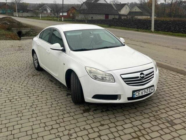 Белый Опель Инсигния, объемом двигателя 2 л и пробегом 274 тыс. км за 6500 $, фото 1 на Automoto.ua