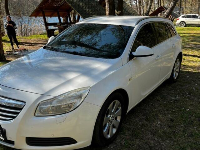 Білий Опель Інсігнія, об'ємом двигуна 1.96 л та пробігом 190 тис. км за 6999 $, фото 1 на Automoto.ua