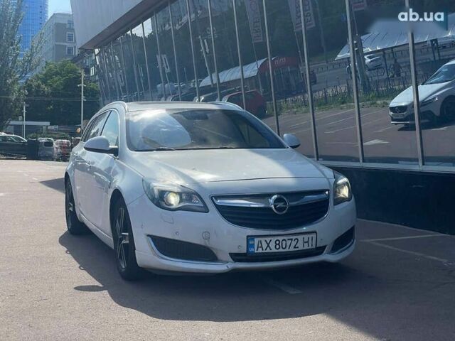 Белый Опель Инсигния, объемом двигателя 2 л и пробегом 297 тыс. км за 10700 $, фото 1 на Automoto.ua