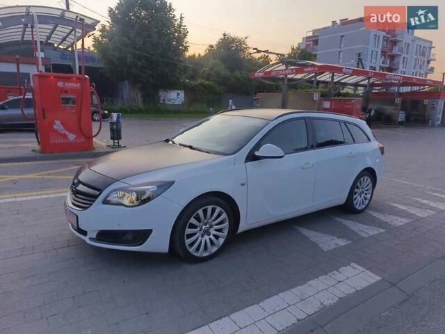 Белый Опель Инсигния, объемом двигателя 2 л и пробегом 248 тыс. км за 9650 $, фото 1 на Automoto.ua