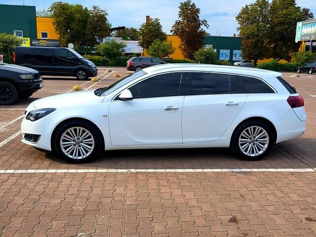 Білий Опель Інсігнія, об'ємом двигуна 2 л та пробігом 201 тис. км за 12450 $, фото 1 на Automoto.ua