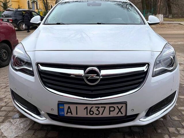 Белый Опель Инсигния, объемом двигателя 2 л и пробегом 198 тыс. км за 9900 $, фото 1 на Automoto.ua