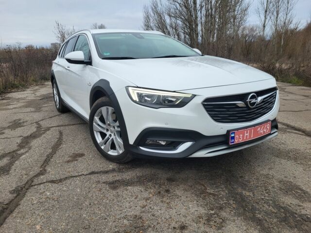 Білий Опель Інсігнія, об'ємом двигуна 2 л та пробігом 230 тис. км за 15400 $, фото 1 на Automoto.ua