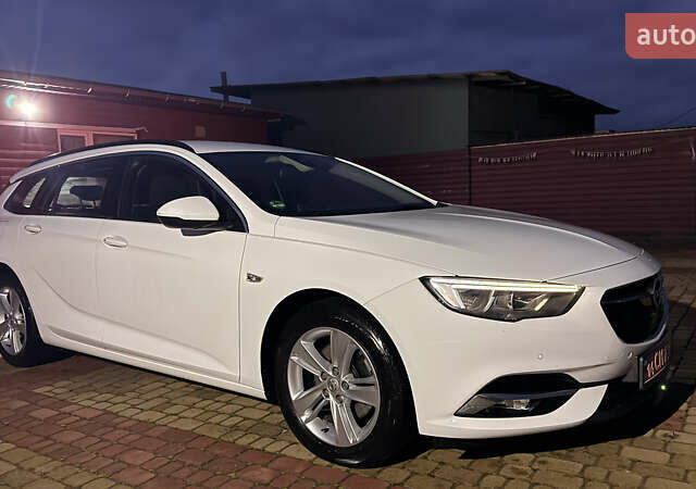 Білий Опель Інсігнія, об'ємом двигуна 1.96 л та пробігом 149 тис. км за 15500 $, фото 1 на Automoto.ua