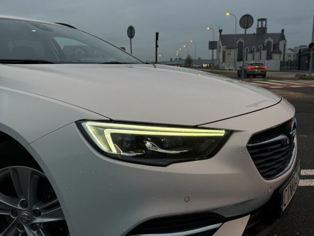 Білий Опель Інсігнія, об'ємом двигуна 2 л та пробігом 178 тис. км за 13000 $, фото 1 на Automoto.ua