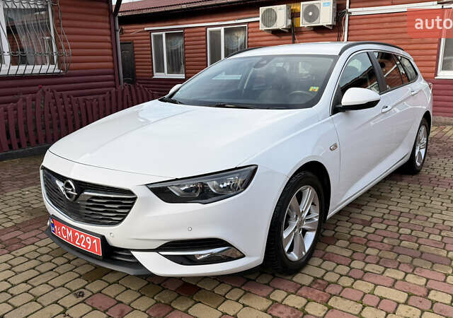 Белый Опель Инсигния, объемом двигателя 1.96 л и пробегом 149 тыс. км за 15900 $, фото 1 на Automoto.ua