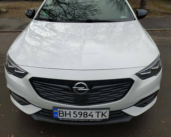 Білий Опель Інсігнія, об'ємом двигуна 1.6 л та пробігом 143 тис. км за 18900 $, фото 1 на Automoto.ua