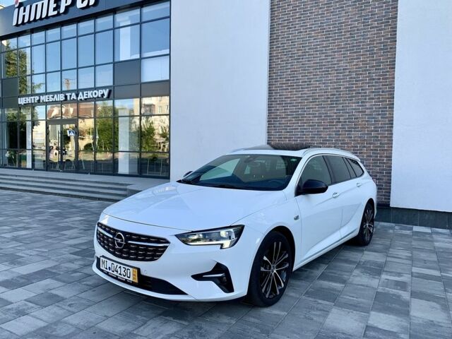 Белый Опель Инсигния, объемом двигателя 2 л и пробегом 189 тыс. км за 18600 $, фото 1 на Automoto.ua