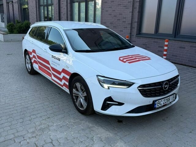 Білий Опель Інсігнія, об'ємом двигуна 2 л та пробігом 150 тис. км за 18500 $, фото 1 на Automoto.ua