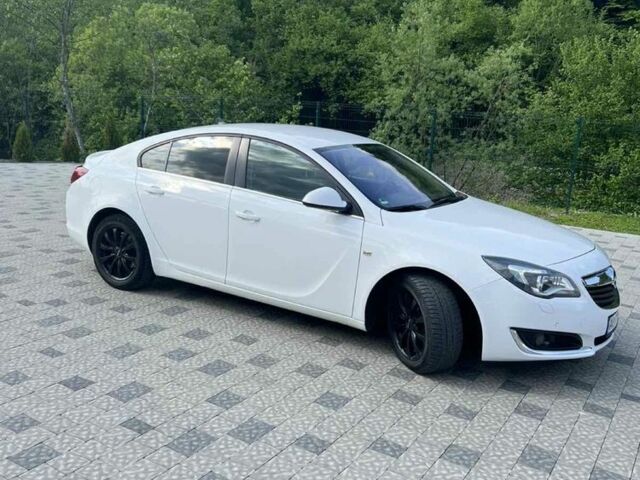 Білий Опель Інсігнія, об'ємом двигуна 1.6 л та пробігом 206 тис. км за 9800 $, фото 1 на Automoto.ua