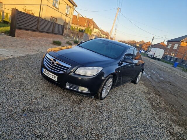 Чорний Опель Інсігнія, об'ємом двигуна 2 л та пробігом 350 тис. км за 6900 $, фото 1 на Automoto.ua