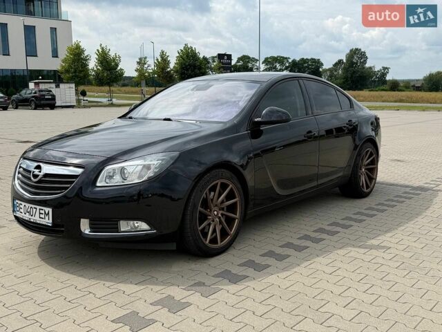 Черный Опель Инсигния, объемом двигателя 2 л и пробегом 248 тыс. км за 7600 $, фото 1 на Automoto.ua
