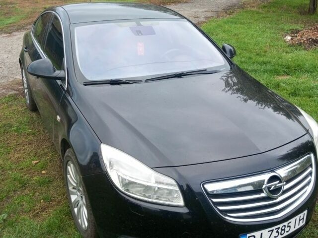 Чорний Опель Інсігнія, об'ємом двигуна 2 л та пробігом 190 тис. км за 7200 $, фото 1 на Automoto.ua