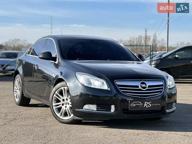 Черный Опель Инсигния, объемом двигателя 2 л и пробегом 263 тыс. км за 8500 $, фото 1 на Automoto.ua