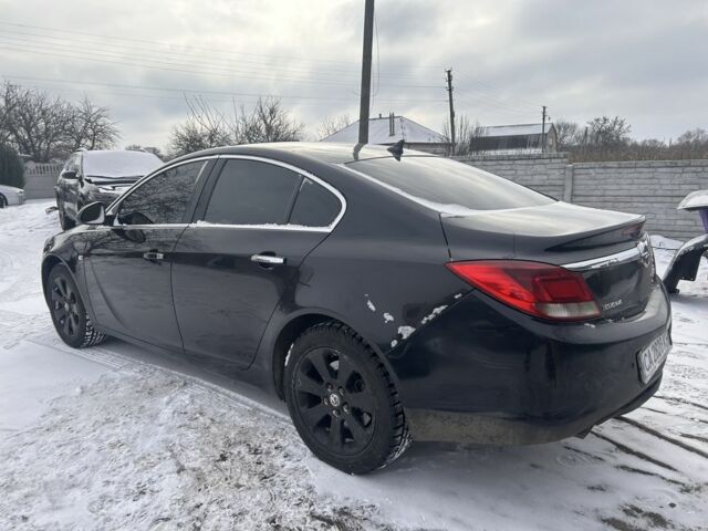 Черный Опель Инсигния, объемом двигателя 2 л и пробегом 260 тыс. км за 5700 $, фото 1 на Automoto.ua