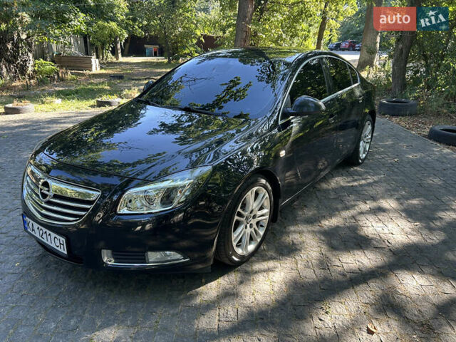 Чорний Опель Інсігнія, об'ємом двигуна 2 л та пробігом 263 тис. км за 7900 $, фото 1 на Automoto.ua