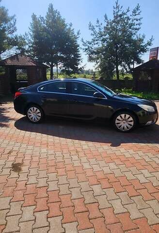 Черный Опель Инсигния, объемом двигателя 1.96 л и пробегом 270 тыс. км за 8950 $, фото 1 на Automoto.ua