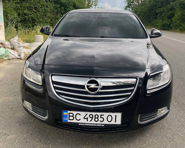 Черный Опель Инсигния, объемом двигателя 2 л и пробегом 245 тыс. км за 8900 $, фото 1 на Automoto.ua