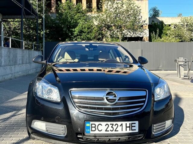 Чорний Опель Інсігнія, об'ємом двигуна 2 л та пробігом 304 тис. км за 7800 $, фото 1 на Automoto.ua