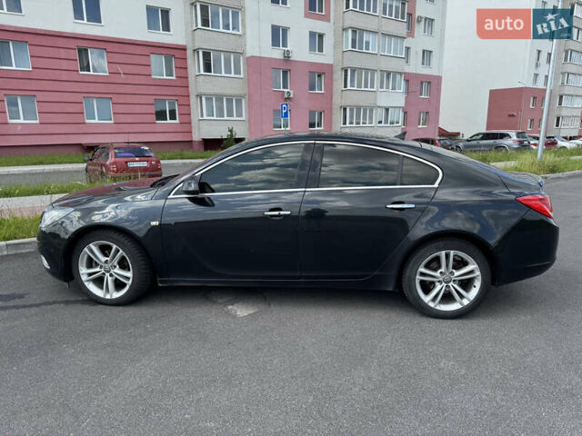 Черный Опель Инсигния, объемом двигателя 1.96 л и пробегом 285 тыс. км за 6500 $, фото 1 на Automoto.ua