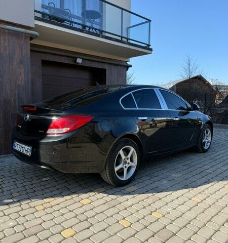 Черный Опель Инсигния, объемом двигателя 2 л и пробегом 282 тыс. км за 9500 $, фото 1 на Automoto.ua