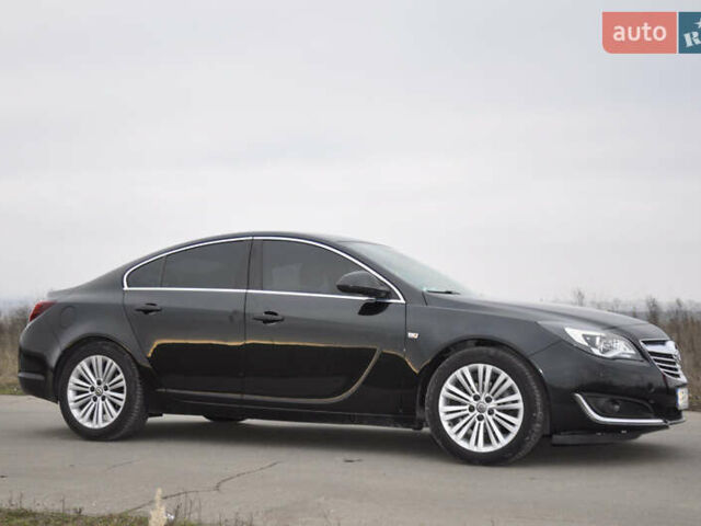 Черный Опель Инсигния, объемом двигателя 1.96 л и пробегом 135 тыс. км за 11000 $, фото 1 на Automoto.ua