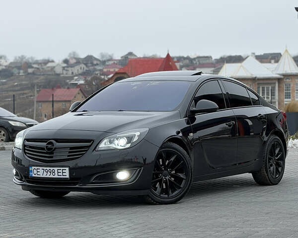 Чорний Опель Інсігнія, об'ємом двигуна 2 л та пробігом 308 тис. км за 11700 $, фото 1 на Automoto.ua