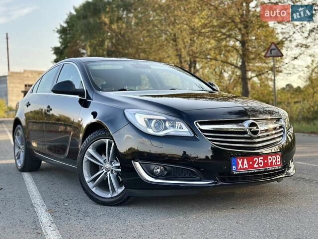 Черный Опель Инсигния, объемом двигателя 2 л и пробегом 208 тыс. км за 12500 $, фото 1 на Automoto.ua