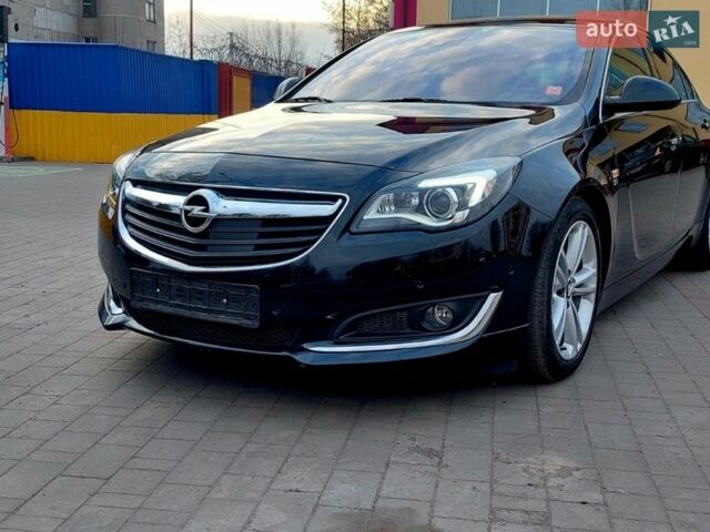Чорний Опель Інсігнія, об'ємом двигуна 1.96 л та пробігом 191 тис. км за 13700 $, фото 1 на Automoto.ua