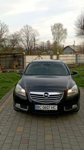 Чорний Опель Інсігнія, об'ємом двигуна 1.96 л та пробігом 250 тис. км за 6500 $, фото 1 на Automoto.ua
