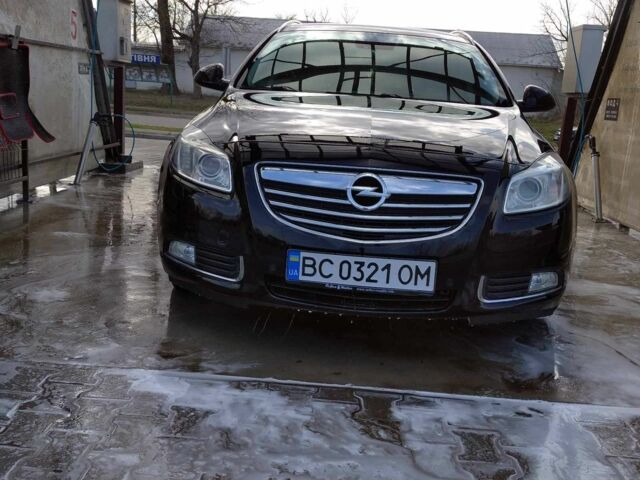 Черный Опель Инсигния, объемом двигателя 2 л и пробегом 260 тыс. км за 6500 $, фото 1 на Automoto.ua