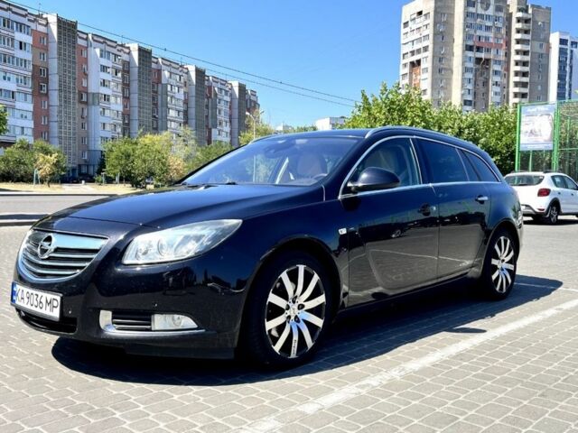 Черный Опель Инсигния, объемом двигателя 2 л и пробегом 297 тыс. км за 6800 $, фото 1 на Automoto.ua