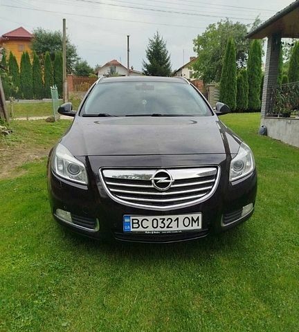 Черный Опель Инсигния, объемом двигателя 2 л и пробегом 260 тыс. км за 6100 $, фото 1 на Automoto.ua