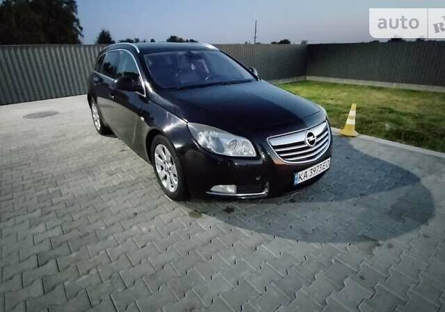 Черный Опель Инсигния, объемом двигателя 1.96 л и пробегом 253 тыс. км за 7400 $, фото 1 на Automoto.ua