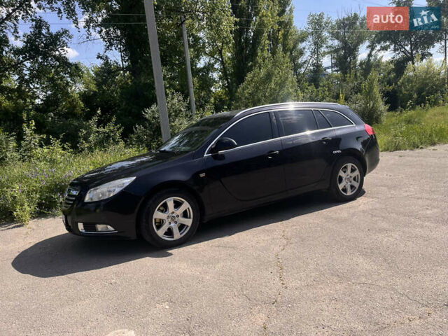 Черный Опель Инсигния, объемом двигателя 2 л и пробегом 248 тыс. км за 6700 $, фото 1 на Automoto.ua