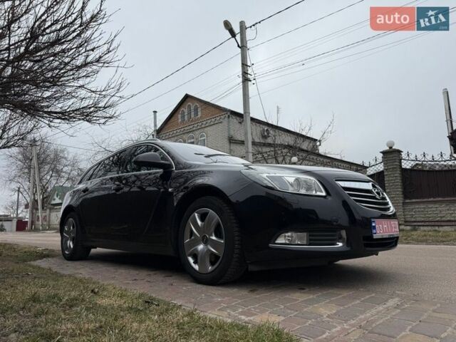 Чорний Опель Інсігнія, об'ємом двигуна 1.6 л та пробігом 204 тис. км за 7900 $, фото 1 на Automoto.ua